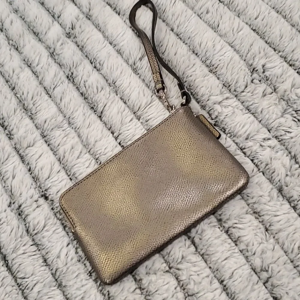 Cute metallic Coach bow wristlet